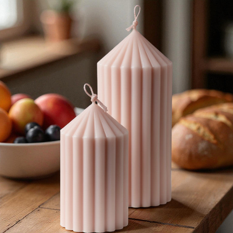 "Pink taper candle 7.5cm, hand-poured in Finland"